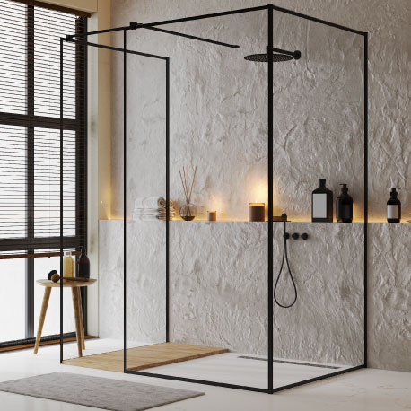 Baño exclusivo de pared con relieve, detalles en negro y luz tenue